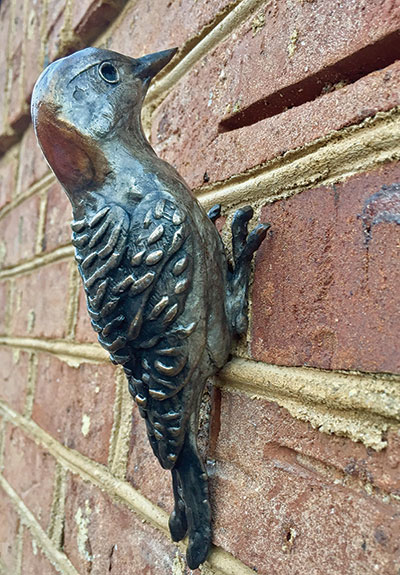 Red Bellied Woodpecker sculpture by Paul Rhymer